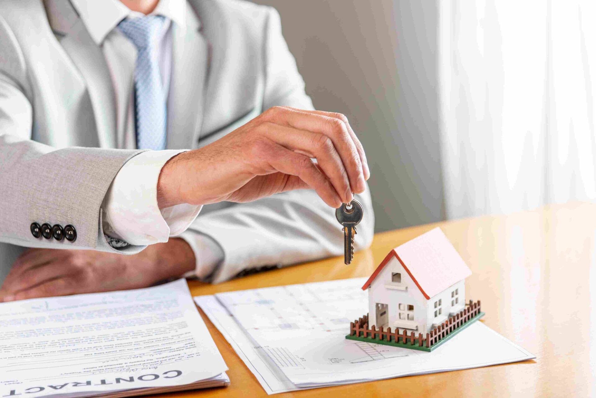 Landlord and tenant signing a rent agreement